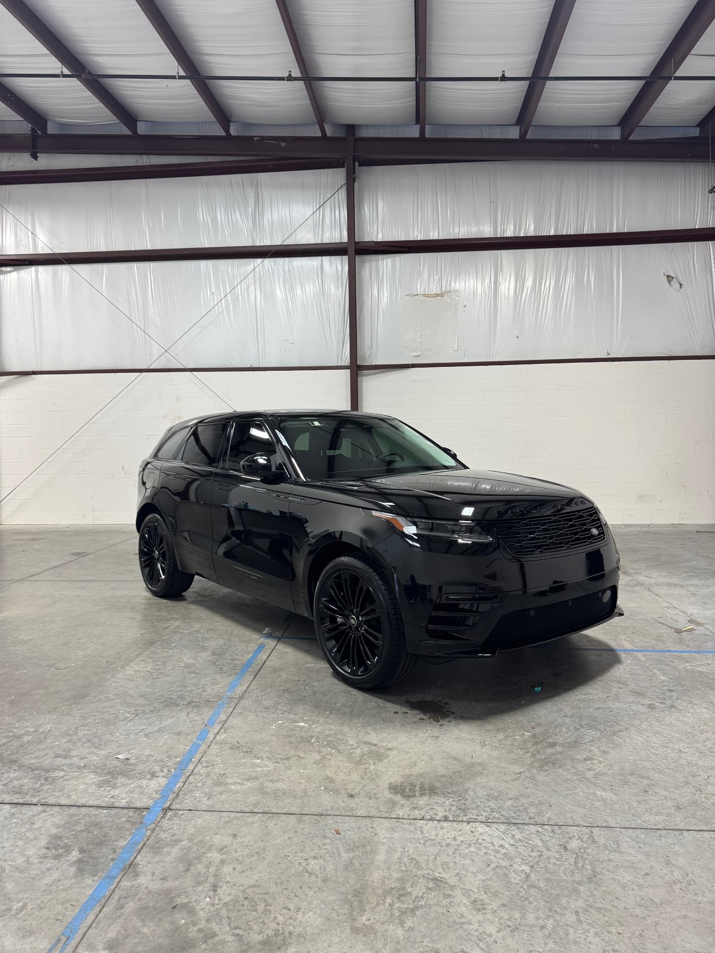Need For Clean ceramic coating applied by hand to a luxury vehicle in Central Florida